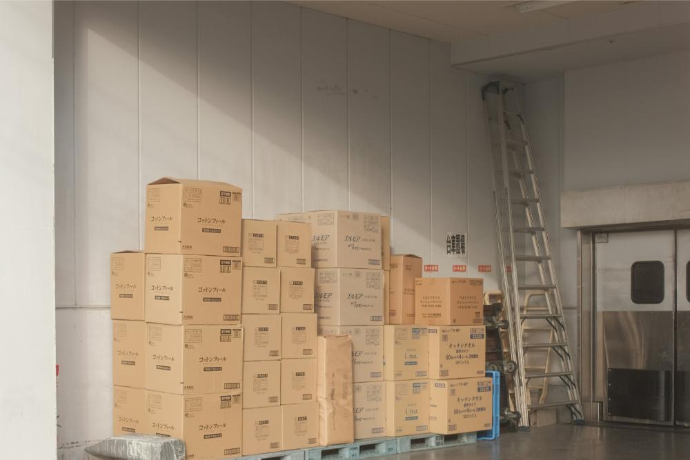 stacked pallet with boxes in a warehouse