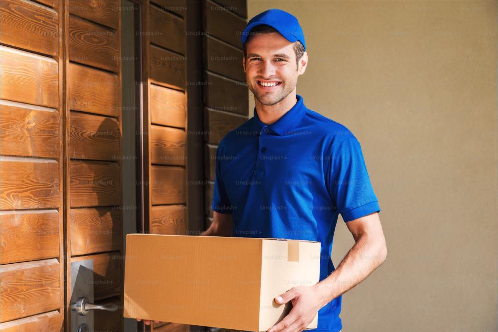 Delivery worker holding package