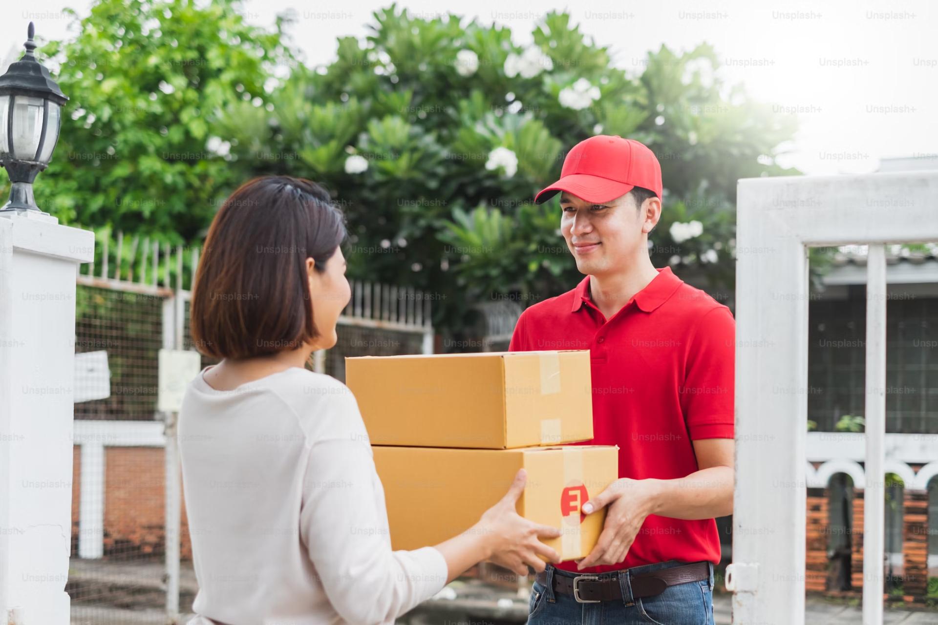 Woman receiving delivery package